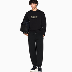 Armani Exchange men’s black diagonal gold crewneck cotton sweatshirt