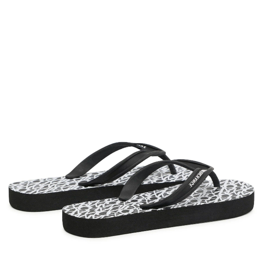 Armani Exchange women's flip-flops in black and optic white with bold logo branding