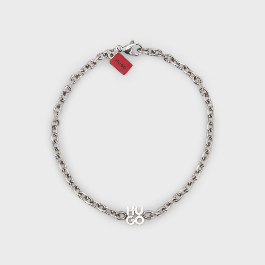 Chain cuff with stacked-logo plaque