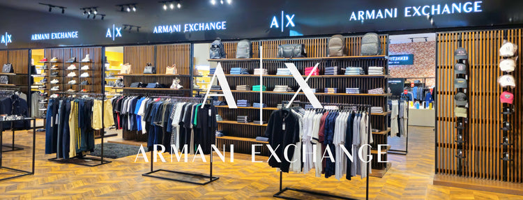 Armani Exchange store interior with clothing racks and branded signs.